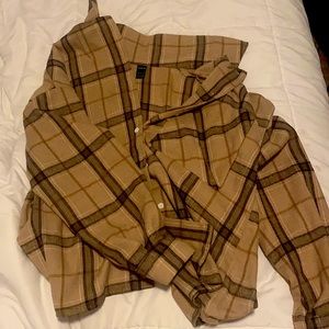 Great to wear over cropped tank